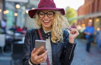 Happy woman with an iphone